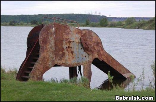 слон